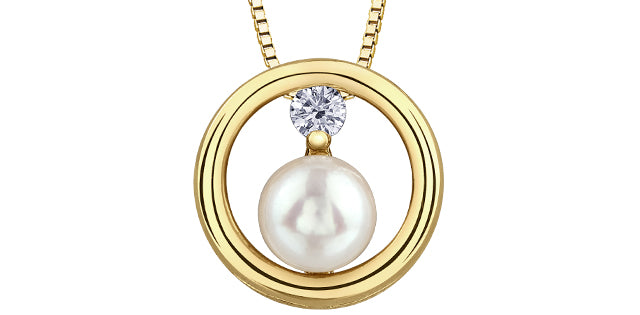 Pearl and diamond pendant and 18
